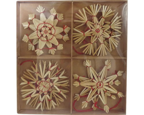 Patru stele de paie ca decorațiuni de Crăciun într-o cutie