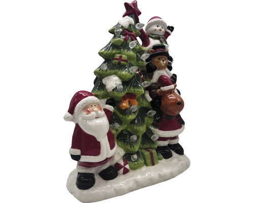 Decorațiune de Crăciun cu Moș Crăciun, om de zăpadă, ursuleț de pluș și ren lângă un brad de Crăciun cu lumini