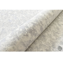 Covor rulat cu model abstract