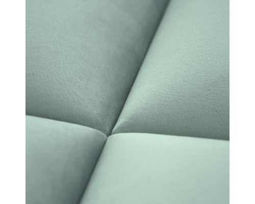 Prim-plan al unei piese de mobilier tapițate cu tapițerie din material textil