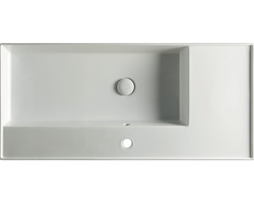 Vedere de sus a unei chiuvete dreptunghiulare din ceramică cu platformă pentru robinet și preaplin