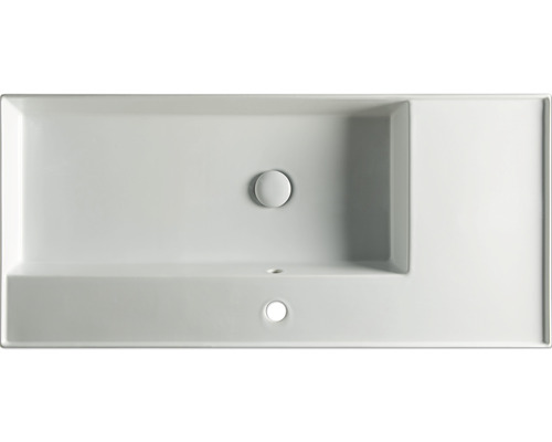 Vedere de sus a unei chiuvete dreptunghiulare cu spațiu de depozitare