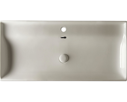 Vedere de sus a unei chiuvete cu preaplin și scurgere.