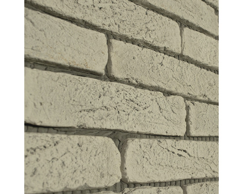 Prim-plan cu placarea peretelui cu aspect de cărămidă