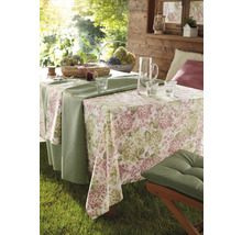 Masa de grădină aranjată cu față de masă cu design floral și pernă de șezut