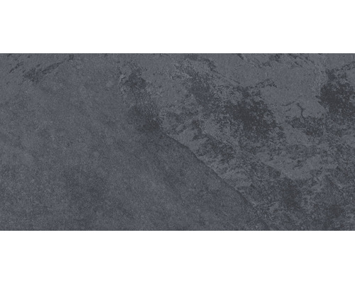 Prim-plan cu o placă de ardezie cu textură aspră.