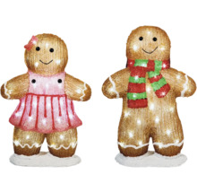 Doi oameni de turtă dulce cu iluminare ca decorațiuni pentru perioada Crăciunului