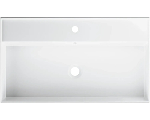 Vedere de sus a unei chiuvete albe cu orificiu pentru robinet și preaplin