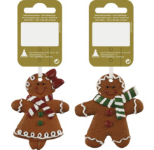 Biscuiți de turtă dulce, bărbat și femeie, ca decorațiuni pentru pomul de Crăciun