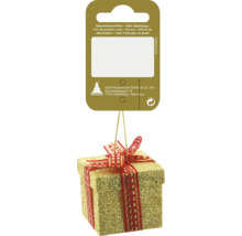 Cadou auriu ca ornament de pom de Crăciun cu fundă roșie