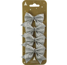 Patru funde argintii ca decorațiuni pentru pomul de Crăciun în ambalaj