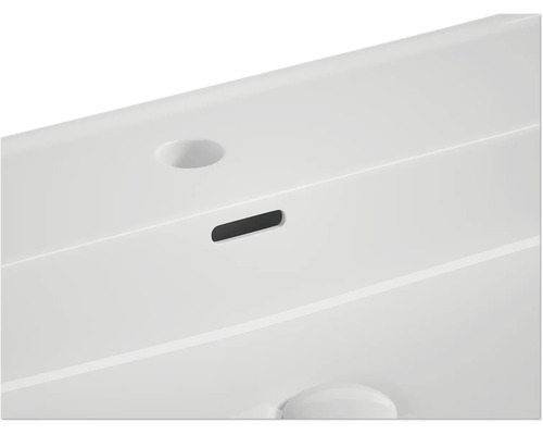 Imagine detaliată a unei chiuvete cu preaplin și orificiu pentru robinet