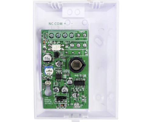 Vedere interioară a unei plăci de detector într-o carcasă albă