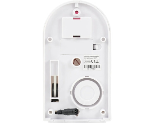 Partea din spate a unei sirene exterioare fără fir, cu compartiment pentru baterii și conector