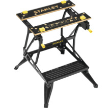 Banc de lucru Stanley cu cadru negru și elemente galbene.