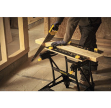 Artizan taie lemn pe un banc de lucru Stanley