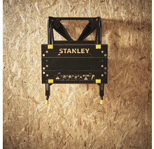 Banc de lucru Stanley închis pe un perete