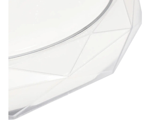 Prim-plan cu abajur transparent cu model geometric