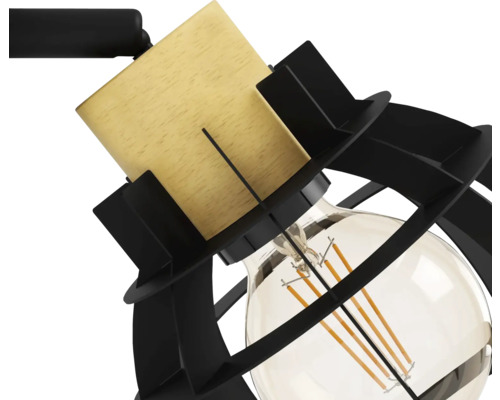 Prim-plan cu o lampă cu aplicație din lemn și cușcă metalică