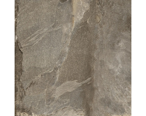 Prim-plan cu o placă de podea din piatră naturală