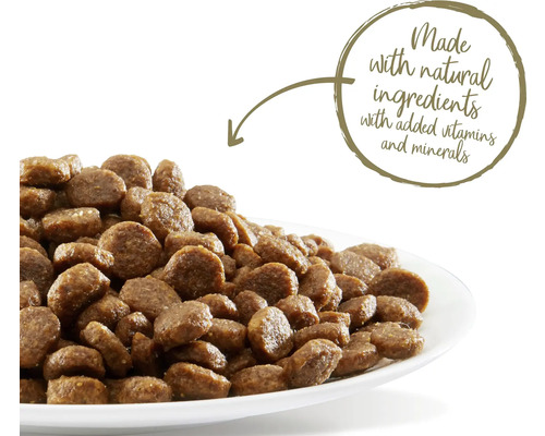 Hrană pentru câini cu ingrediente naturale cu vitamine și minerale adăugate.