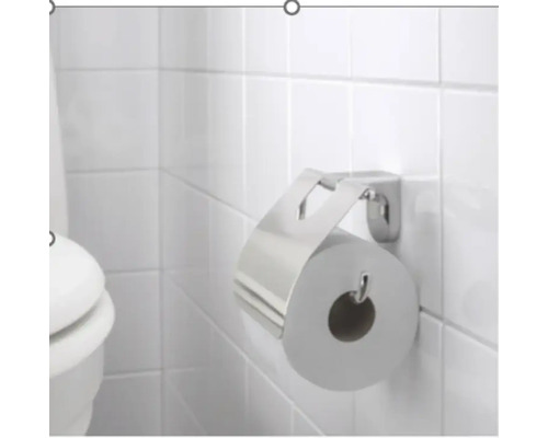 Suport metalic pentru hârtie igienică cu hârtie igienică pe perete faianțat