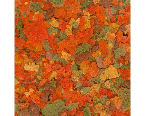 Prim-plan cu fulgi de hrană pentru pești