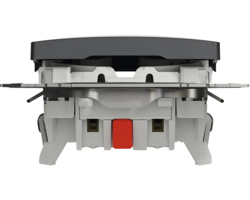 Prim-plan cu un întrerupător cu elemente metalice și un buton roșu