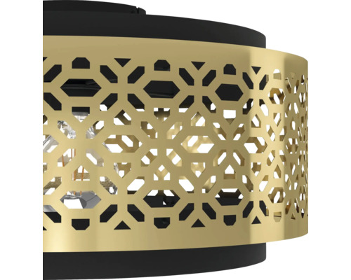 Imagine detaliată a unei lămpi de tavan cu abajur auriu ajurat