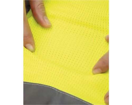 Prim-plan cu o țesătură galbenă respirabilă