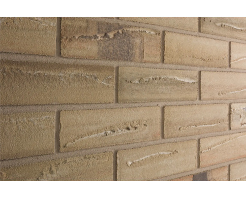 Elabrick Cărămidă aparentă flexibilă Corsica bej 24x7,1 cm Prim-plan cu un perete cu panouri decorative din cărămidă