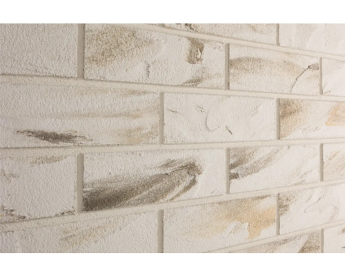 Elabrick Cărămidă aparentă flexibilă Sevilla crem 24x7,1 cm Prim-plan cu o placare de perete cu model de cărămidă