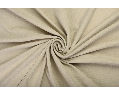 Material textil bej texturat la metru, în prim-plan