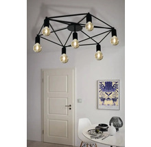 Plafonieră neagră cu design geometric și mai multe becuri într-o sufragerie.