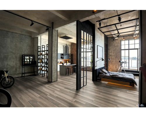 Apartament tip loft cu zonă de living deschisă, bucătărie și dormitor în stil industrial modern