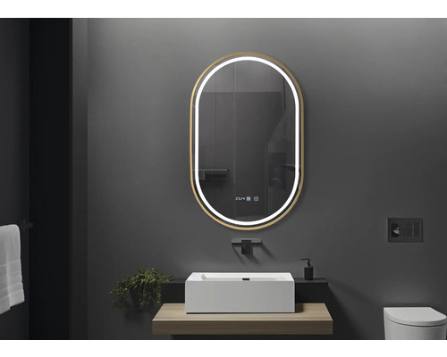 Baie modernă cu oglindă ovală, lavoar așezat și perete întunecat