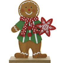 Figurină om de turtă dulce pe soclu cu fular și fulg de nea ca decorațiune de Crăciun