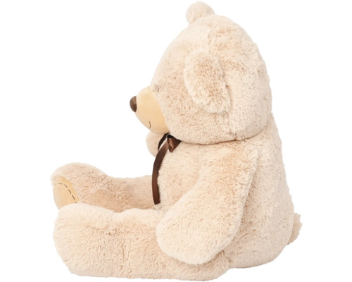 Ursuleț de pluș cu fundă în profil