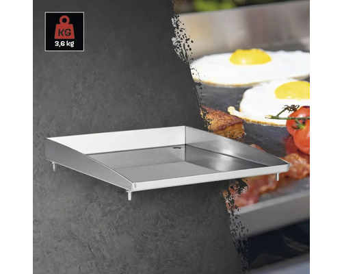 Plită metalică cu greutatea de 3,6 kilograme pentru prepararea alimentelor