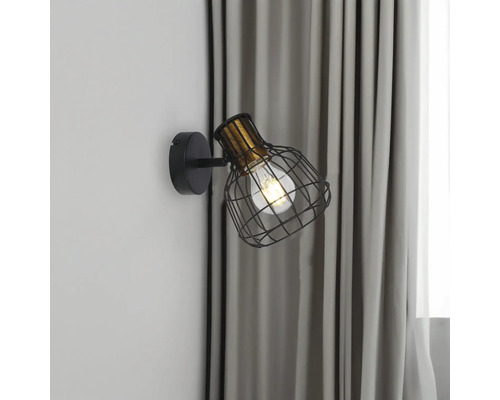 Lampa de perete neagră cu cușcă metalică și lumină