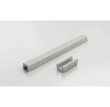Două borduri de beton în formă de U de dimensiuni diferite