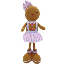 Femeie de turtă dulce, jucărie de pluș cu fundă, nasturi și fustă în dungi