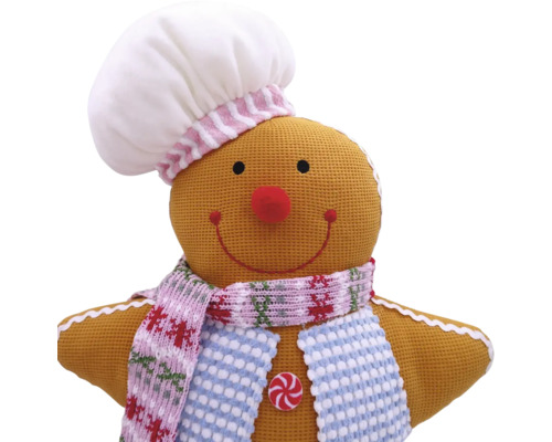 Om de turtă dulce ca decorație cu bonetă de bucătar și fular