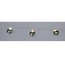 Șir de lumini cu clopote lucioase și stele