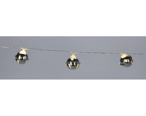 Șir de lumini cu clopote lucioase și stele