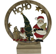 Decorațiune de Crăciun cu Moș Crăciun, brad și cadouri într-un cadru de lemn