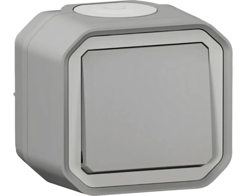 Un întrerupător gri, montat la suprafață, pentru instalații electrice.