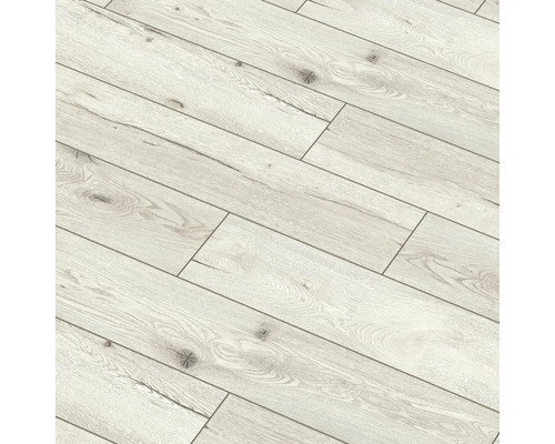 Prim-plan cu podea laminată deschisă la culoare, cu textură de lemn