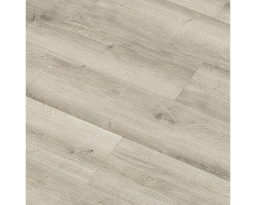 Prim-plan cu podea laminată deschisă la culoare, cu textură de lemn