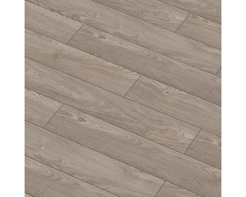 Pardoseală laminată montată cu aspect de lemn.